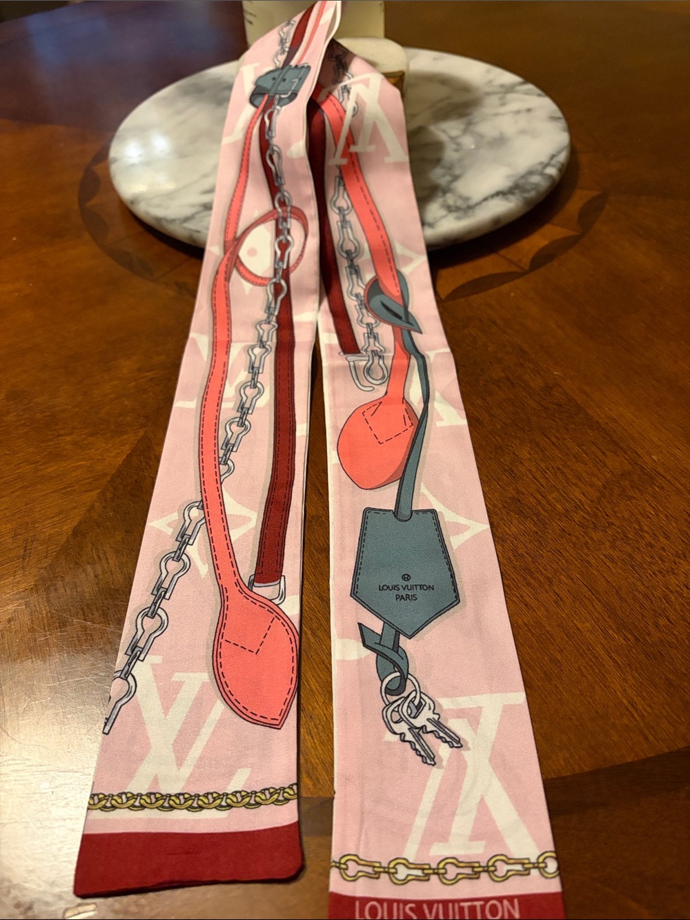Louis Vuitton Pink and Cream Printed Silk Twilly with Bag Motif - Picture 2 of 2